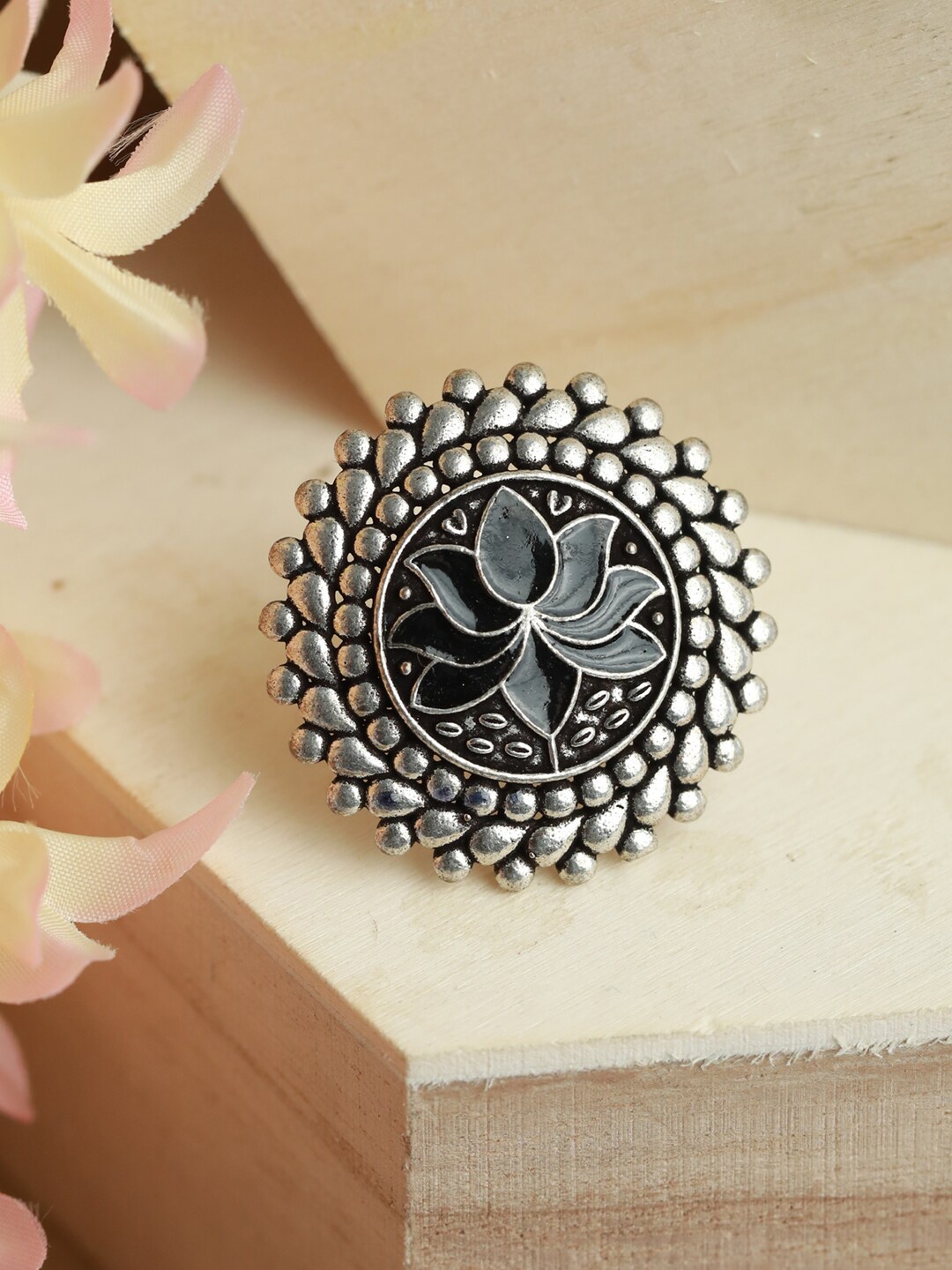 

Jazz and Sizzle Women Silver-Plated Black Lotus-Shaped Adjustable Finger Ring