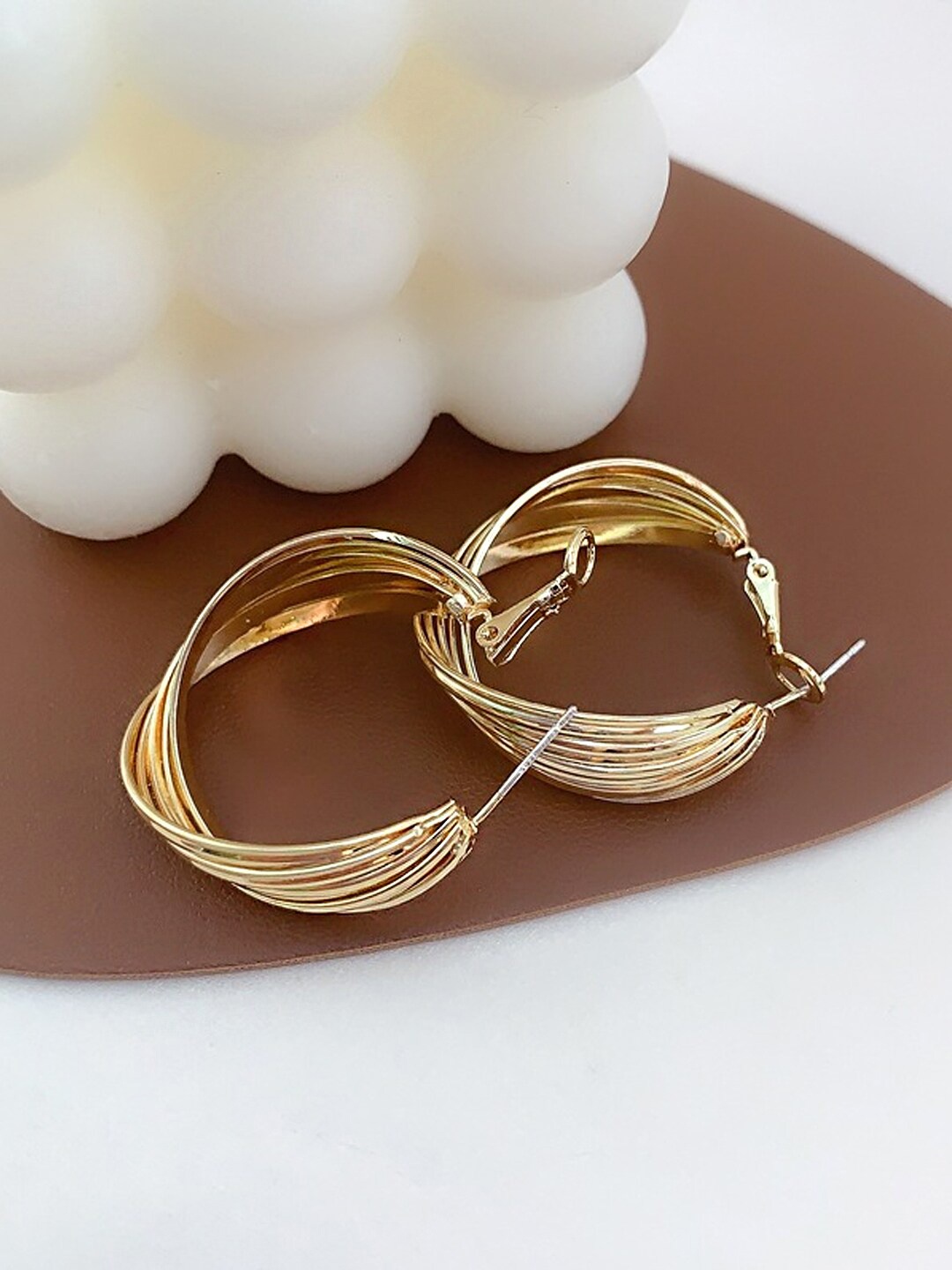 

Yellow Chimes Women Gold-Toned Contemporary Twisted Hoop Earrings