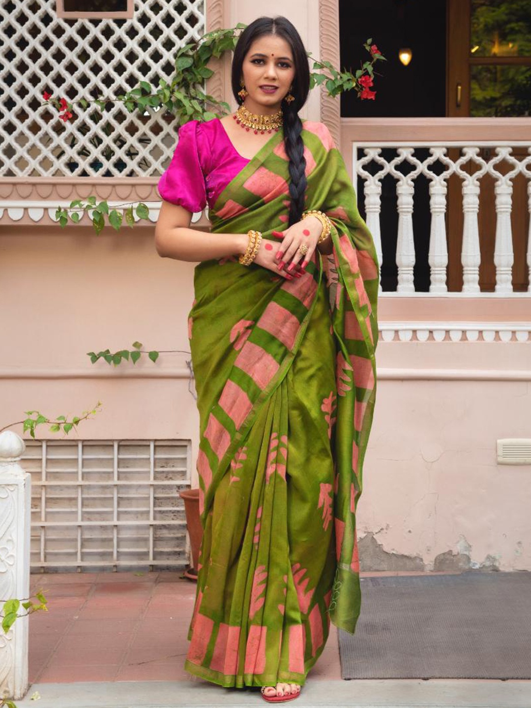 

Baisacrafts Women Green & Pink Ethnic Motifs Art Silk Saree