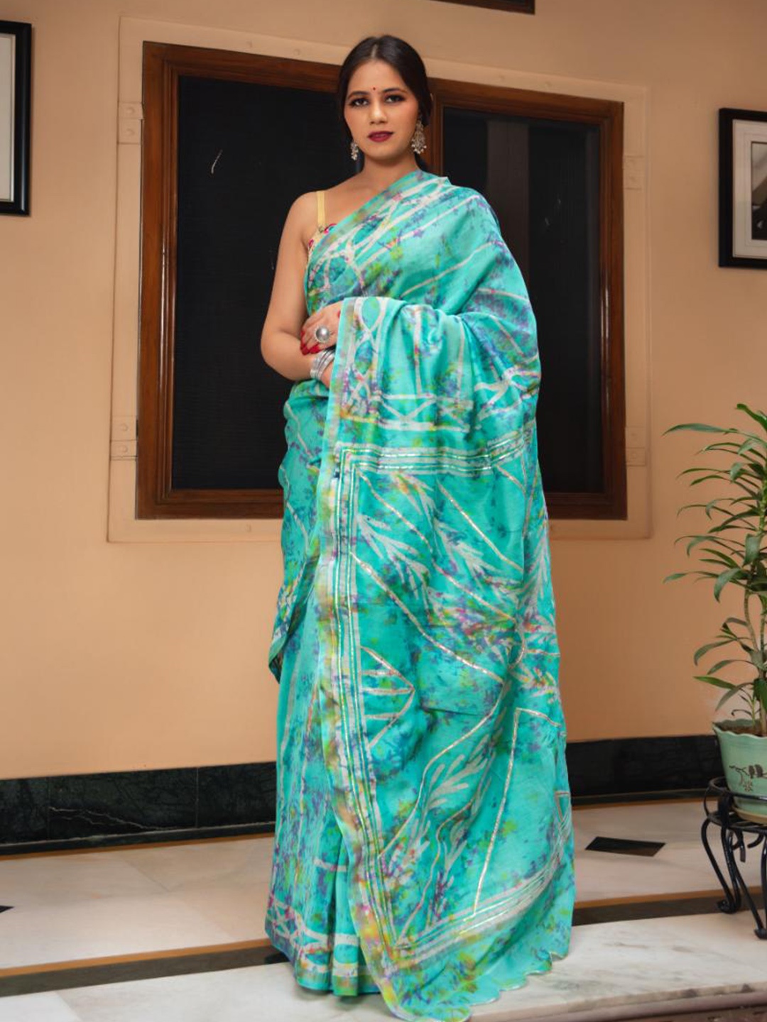

Baisacrafts Teal & Purple Batik Gotta Patti Art Silk Block Print Saree