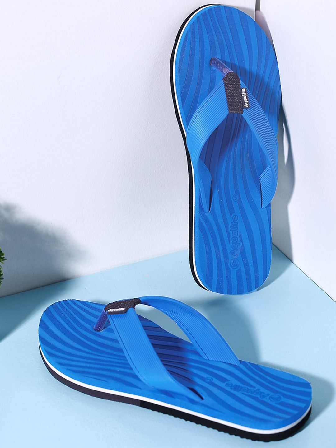 

Aqualite Women Blue & Black Rubber Thong Flip-Flops