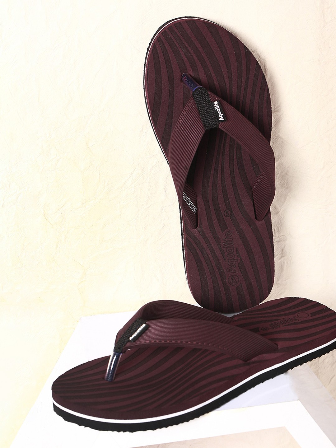 

Aqualite Women Brown & White Rubber Slip-On