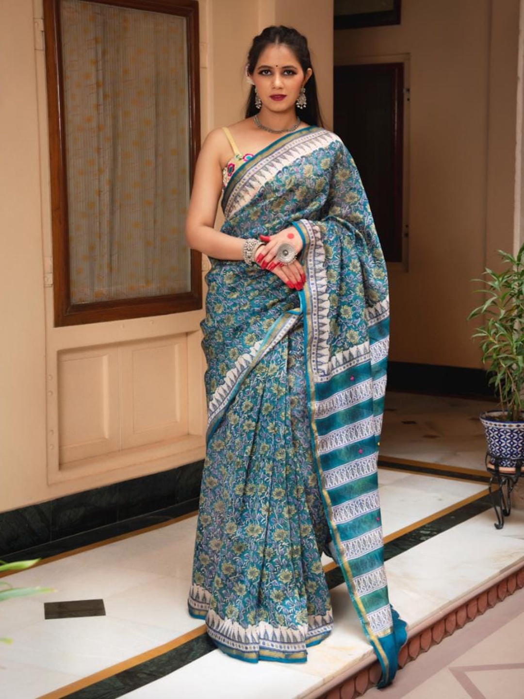 

Baisacrafts Blue & Green Floral Art Silk Saree