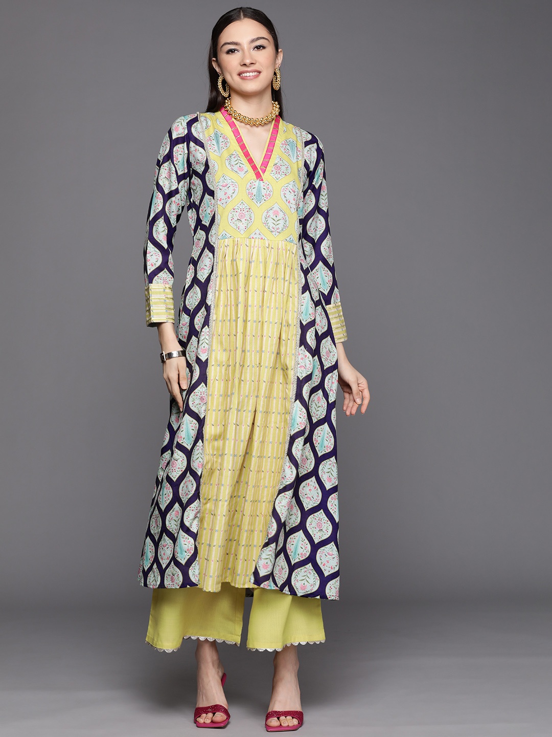 

Ahalyaa Women Yellow Ethnic Motifs Printed Pleated Gotta Patti Kurta with Palazzos