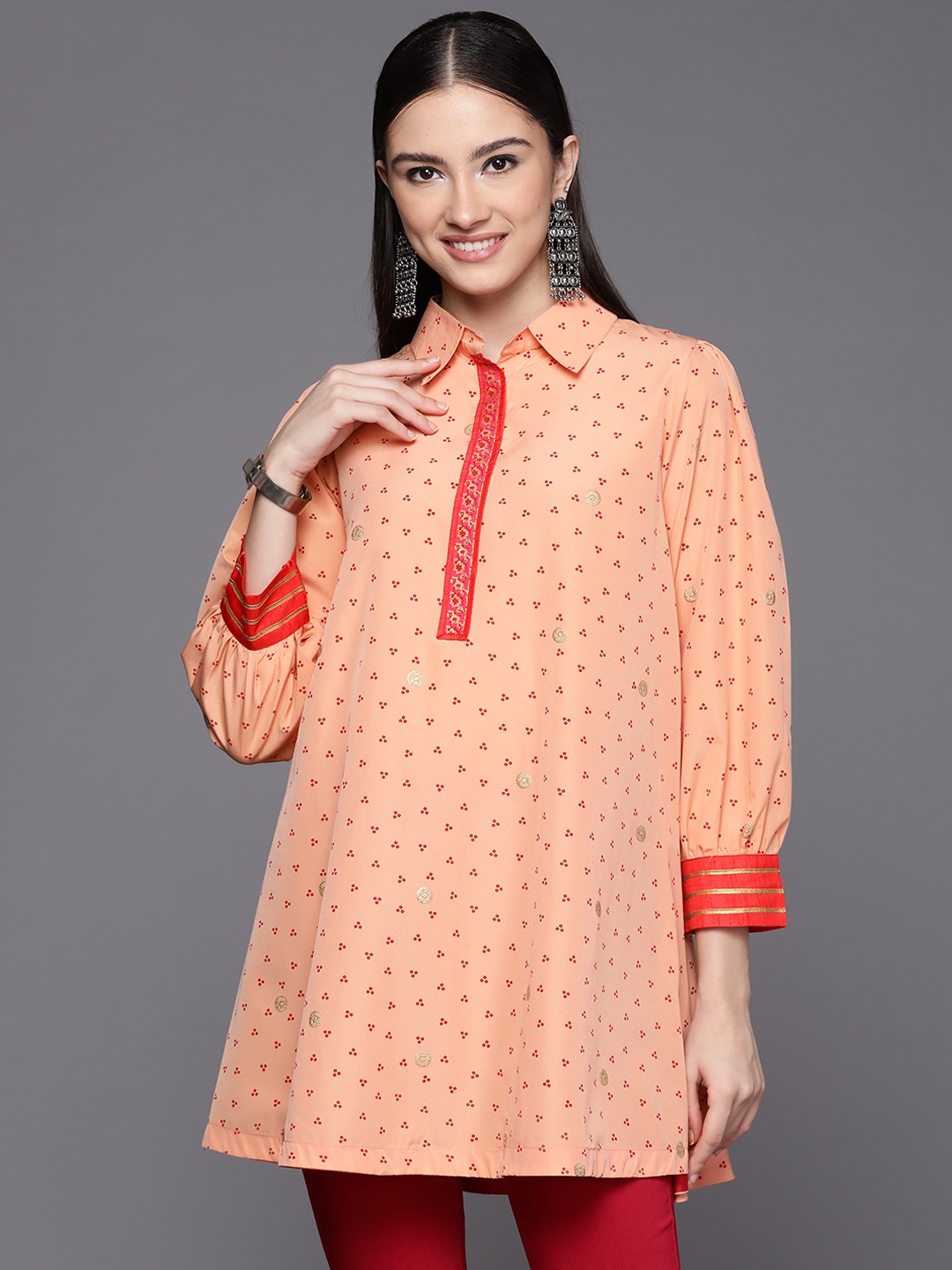 

Ahalyaa Peach-Coloured Geometric Print Shirt Style Crop Top