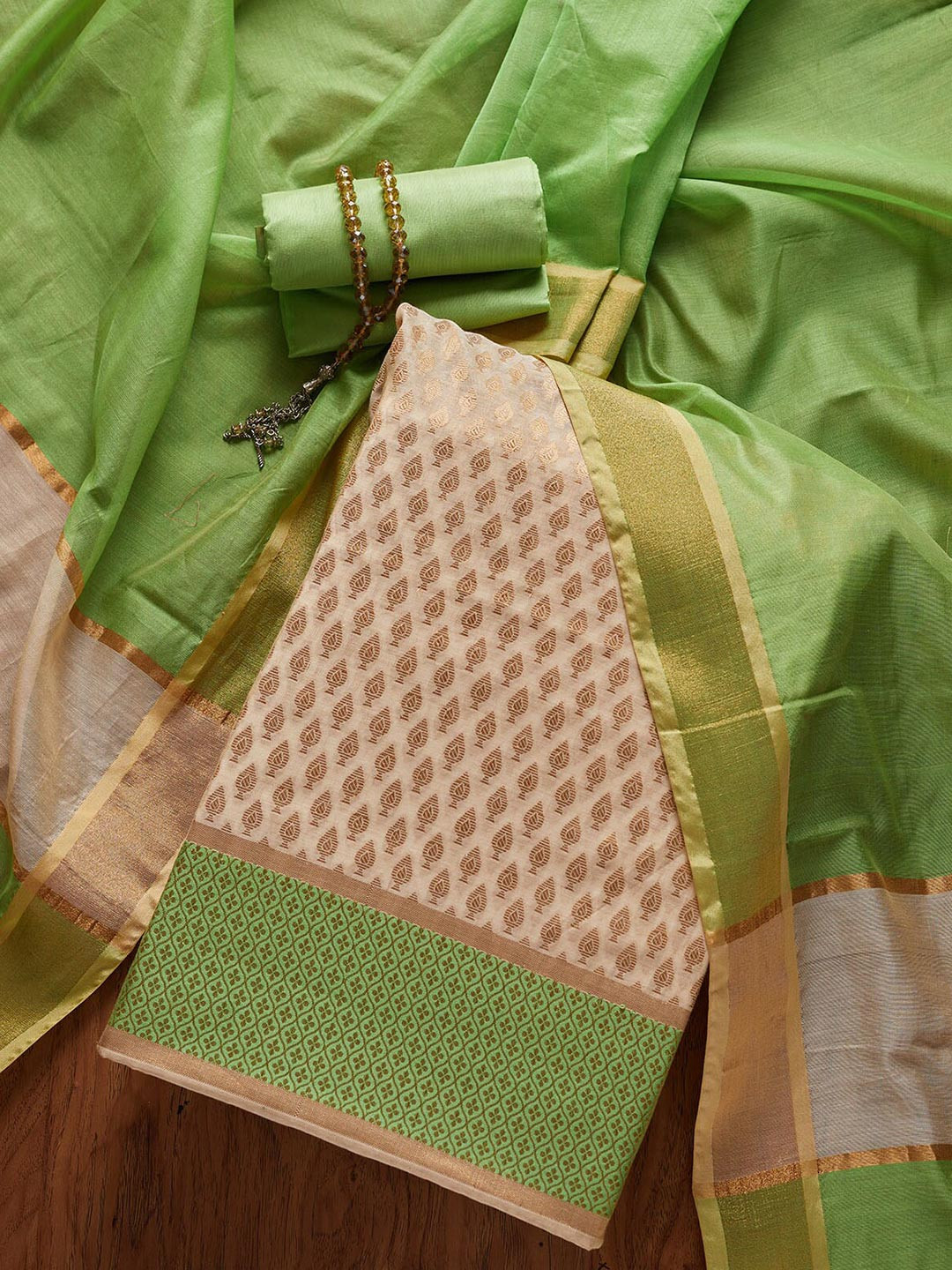 

Koskii Gold-Toned & Cream-Coloured Embroidered Art Silk Unstitched Dress Material