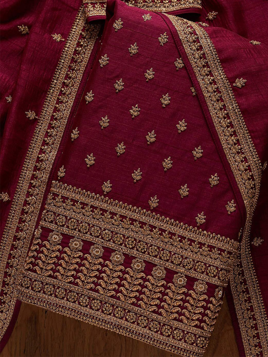 

Koskii Maroon & Gold-Toned Embroidered Art Silk Unstitched Dress Material