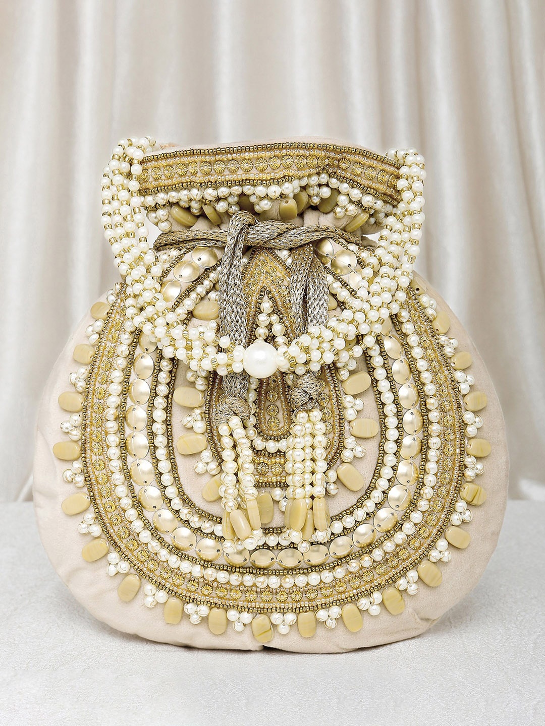

Peora Gold-Toned & White Embellished Potli Clutch