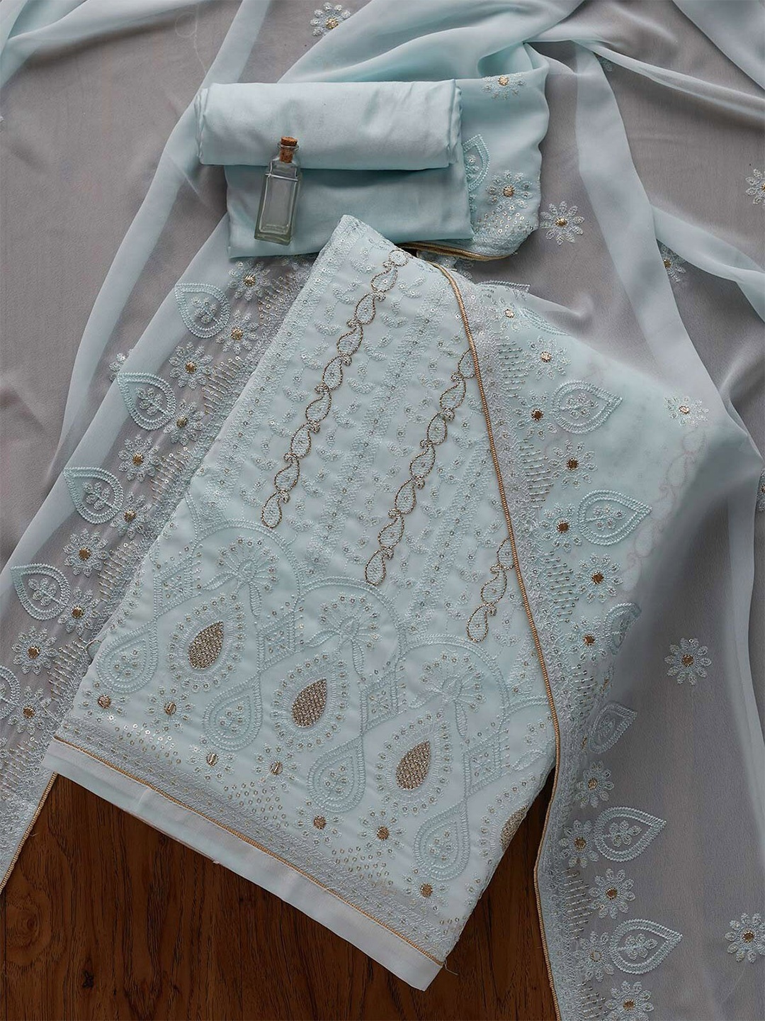 

Koskii Women Blue & Gold-Toned Embroidered Unstitched Dress Material