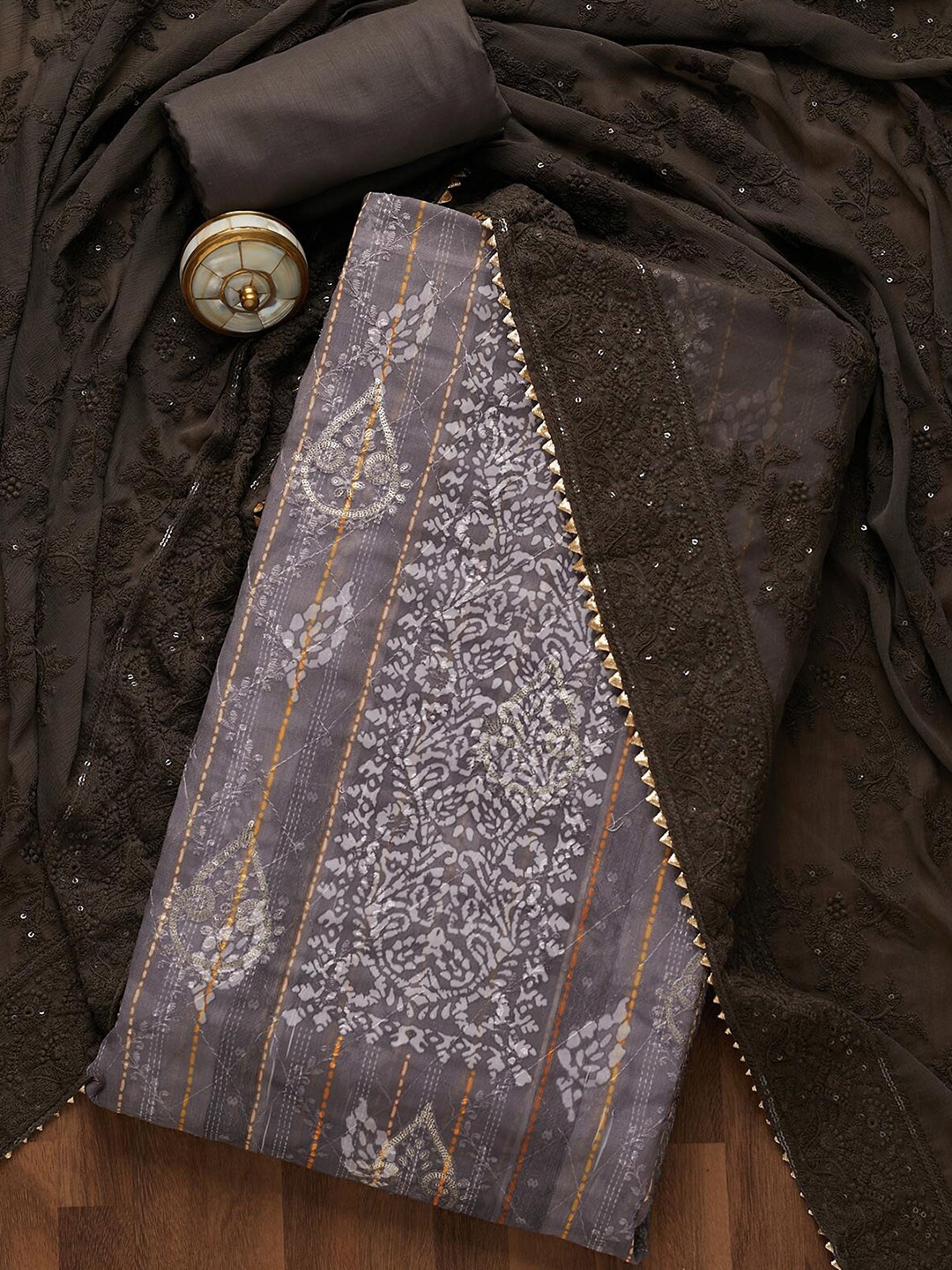 

Koskii Grey & Brown Embroidered Art Silk Unstitched Dress Material