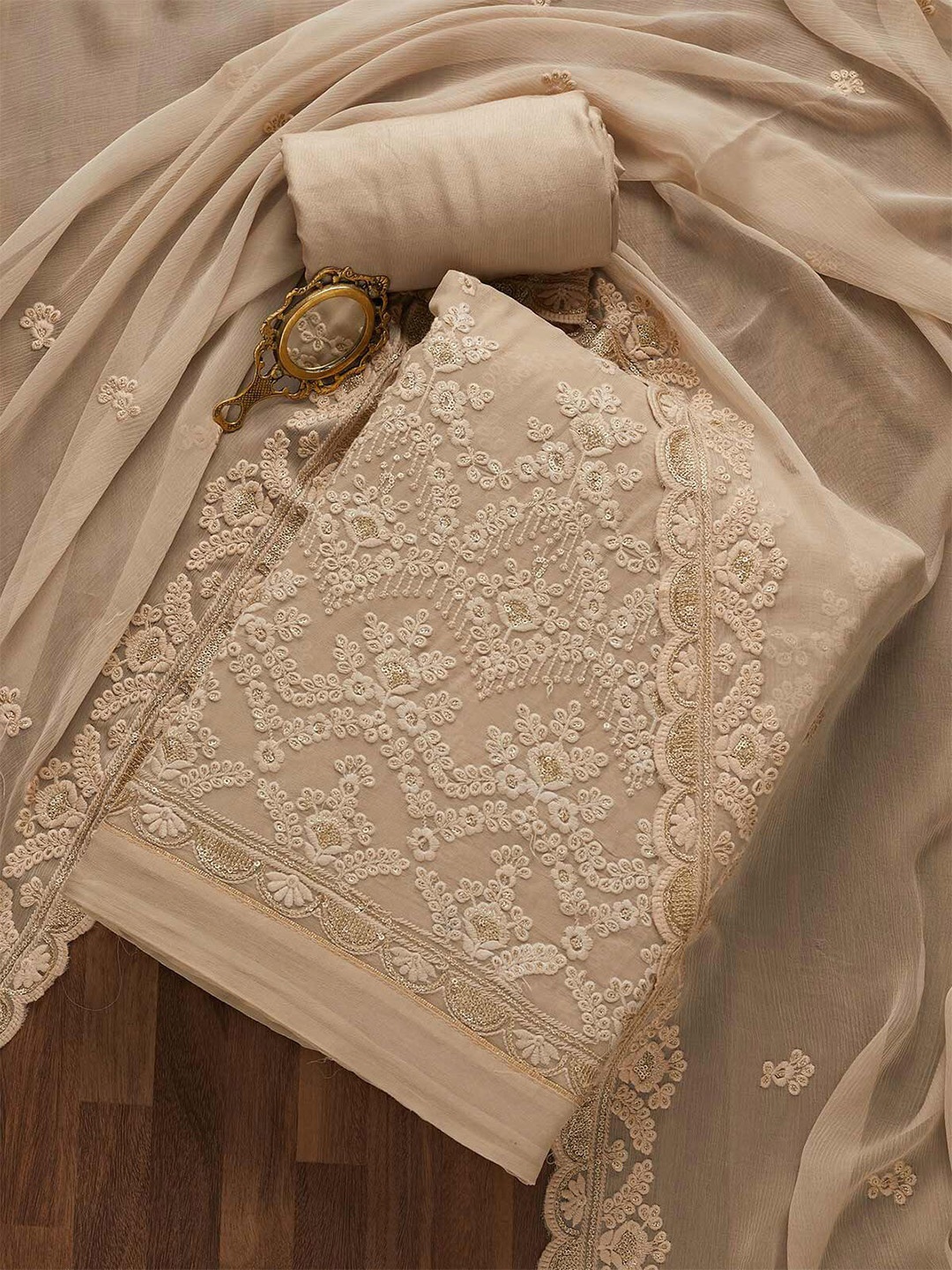 

Koskii Beige Embroidered Unstitched Dress Material