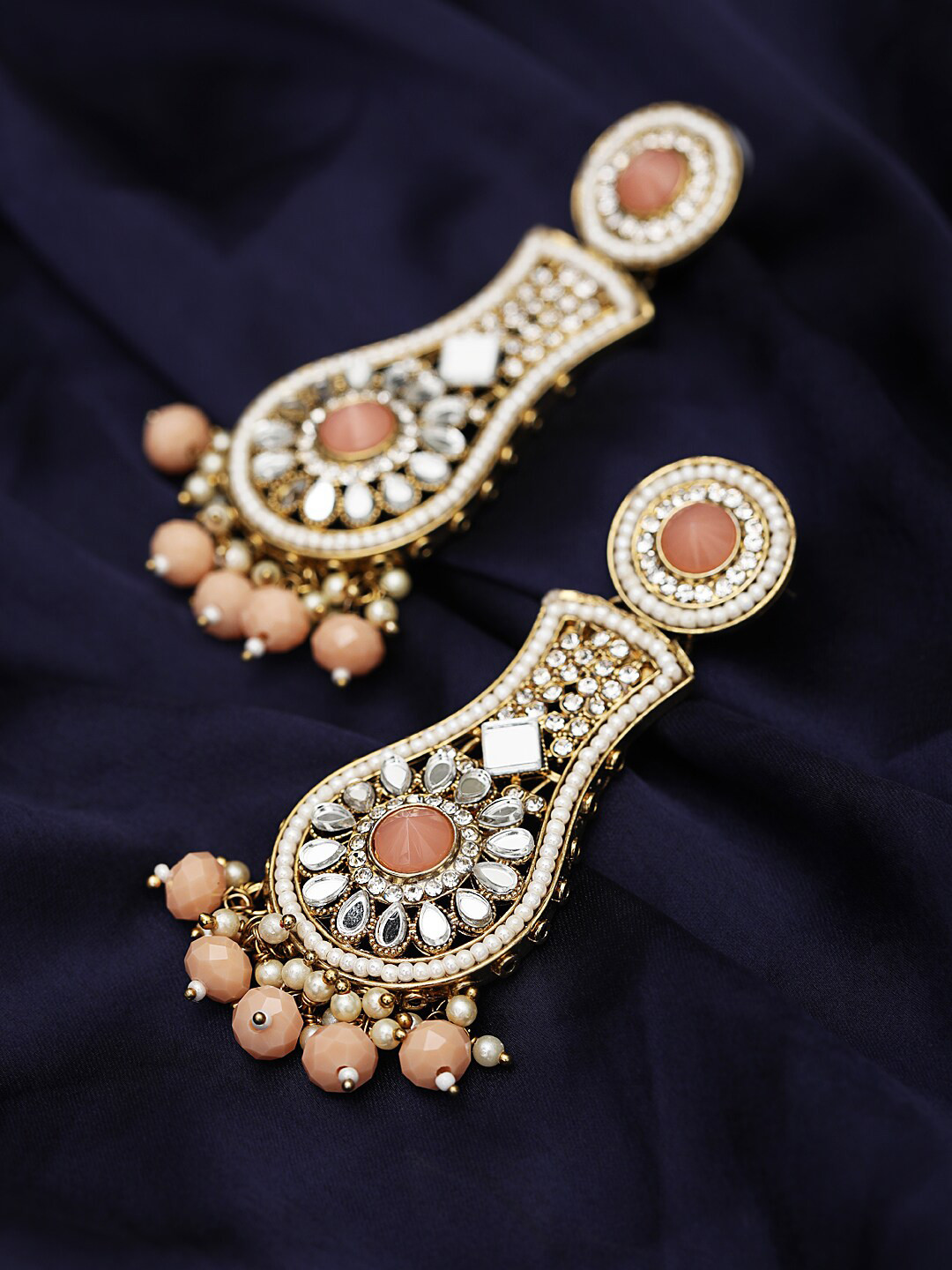 

Jazz and Sizzle Women Peach& Gold-Toned Kundan Studded & Beaded Dome Shaped Drop Earrings