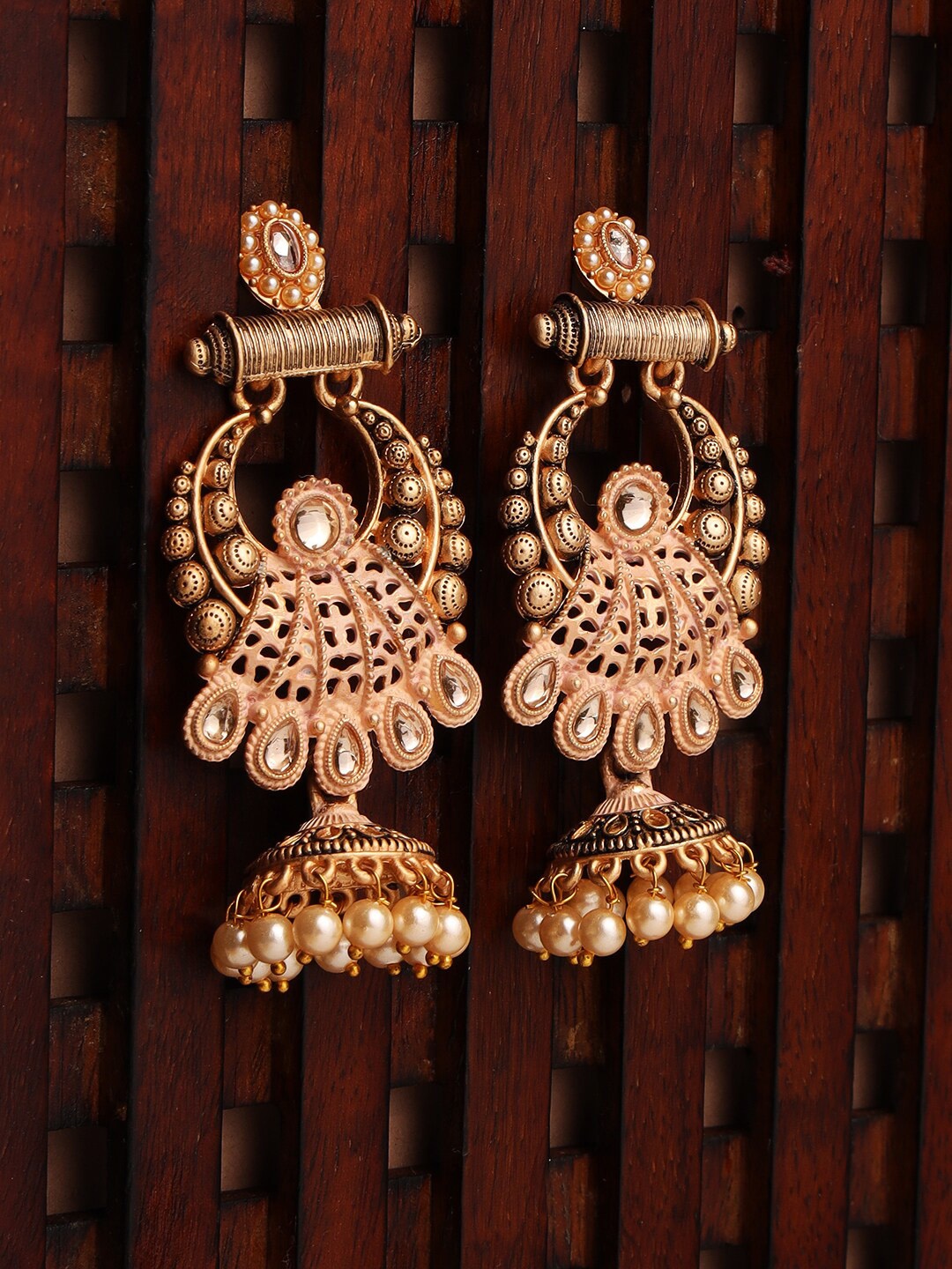 

Jazz and Sizzle Women Gold-Toned & Peach-Colored Dome Shaped Jhumkas Earrings
