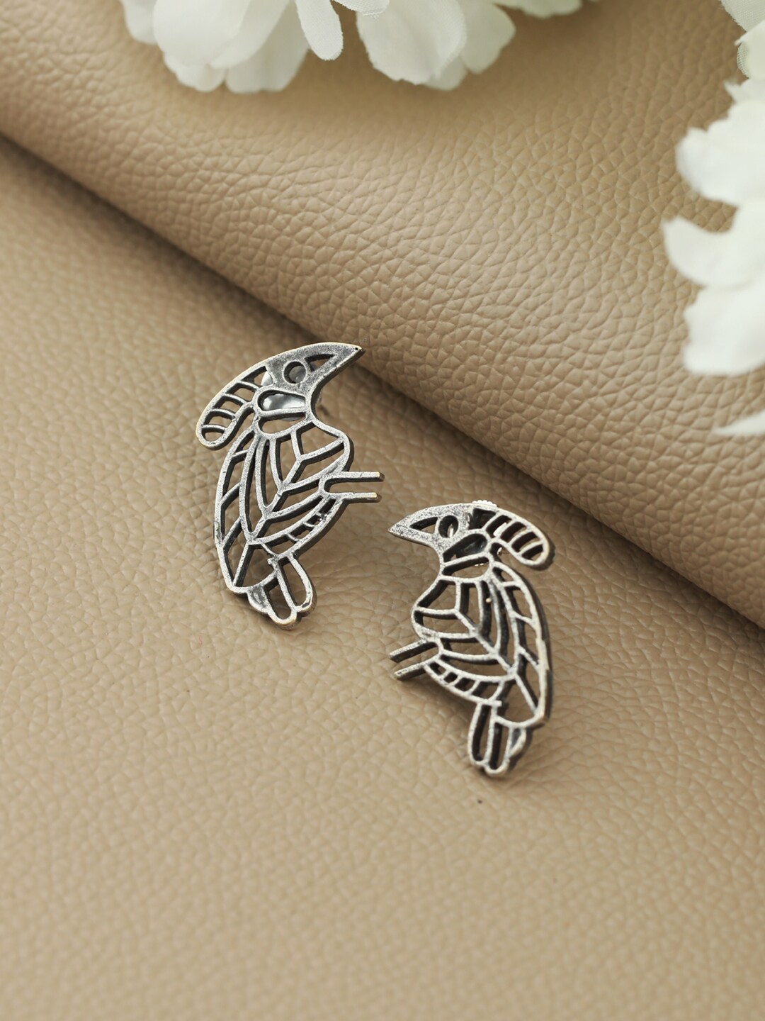 

Jazz and Sizzle Silver-Toned Animal Shaped Studs Earrings