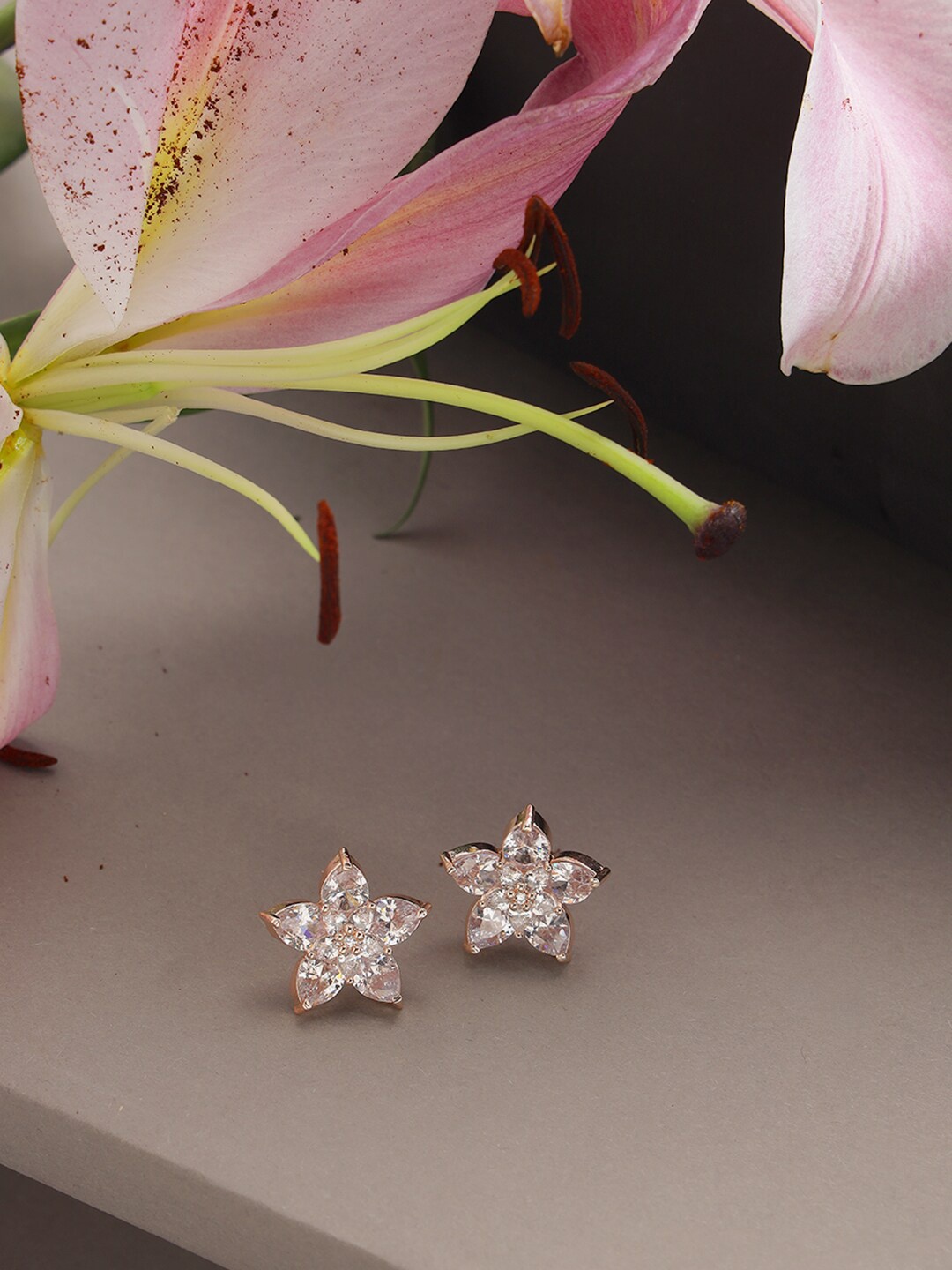 

Jazz and Sizzle Silver-Toned Floral Studs Earrings