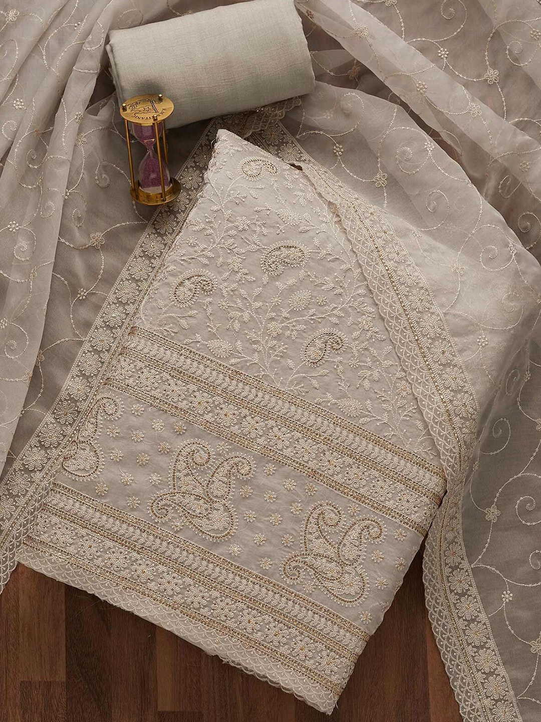 

Koskii Women Grey Embroidered Unstitched Dress Material