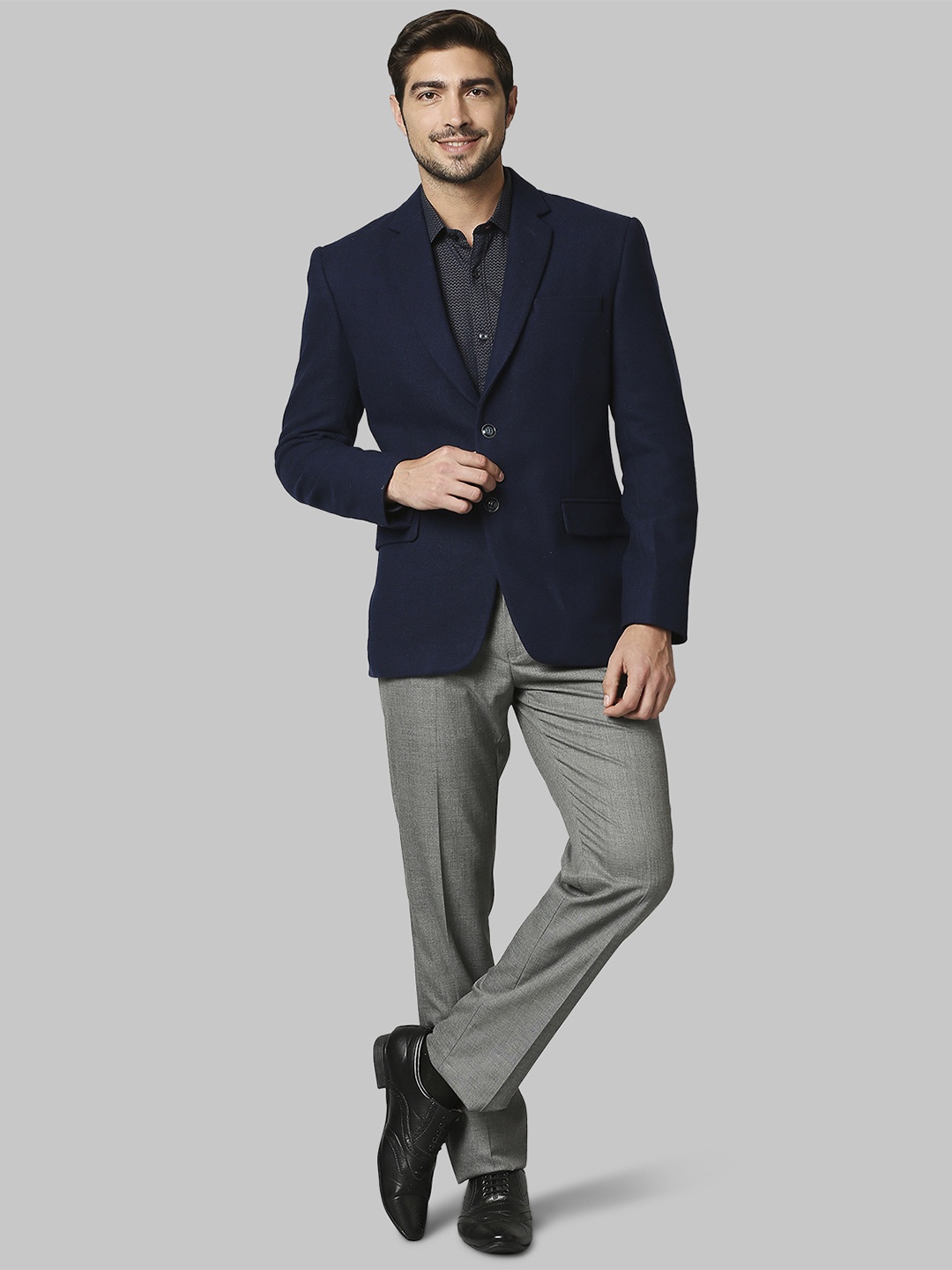 

Raymond Men Blue Solid Single-Breasted Formal Blazers