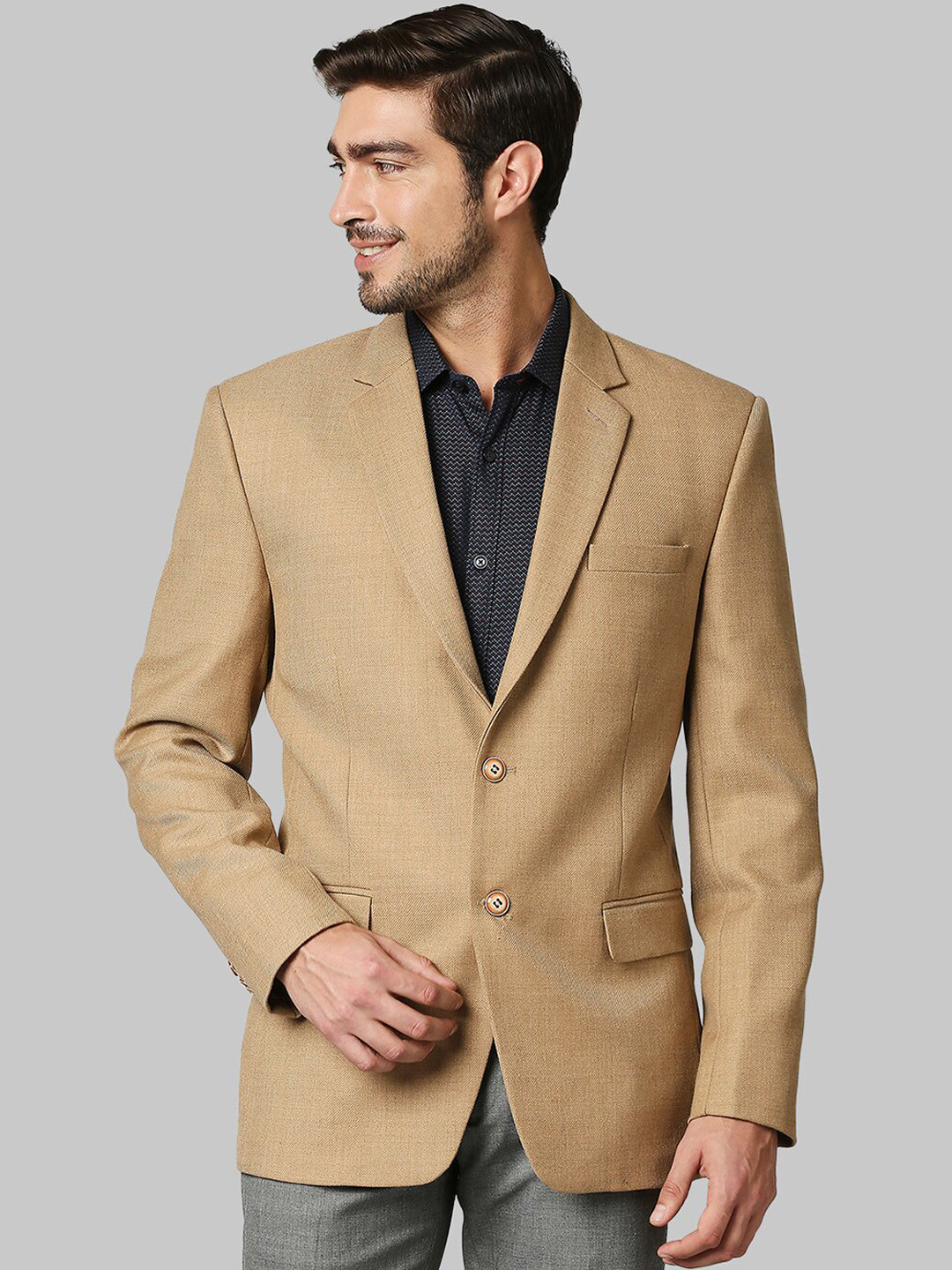 

Raymond Men Beige Solid Single-Breasted Casual Blazers