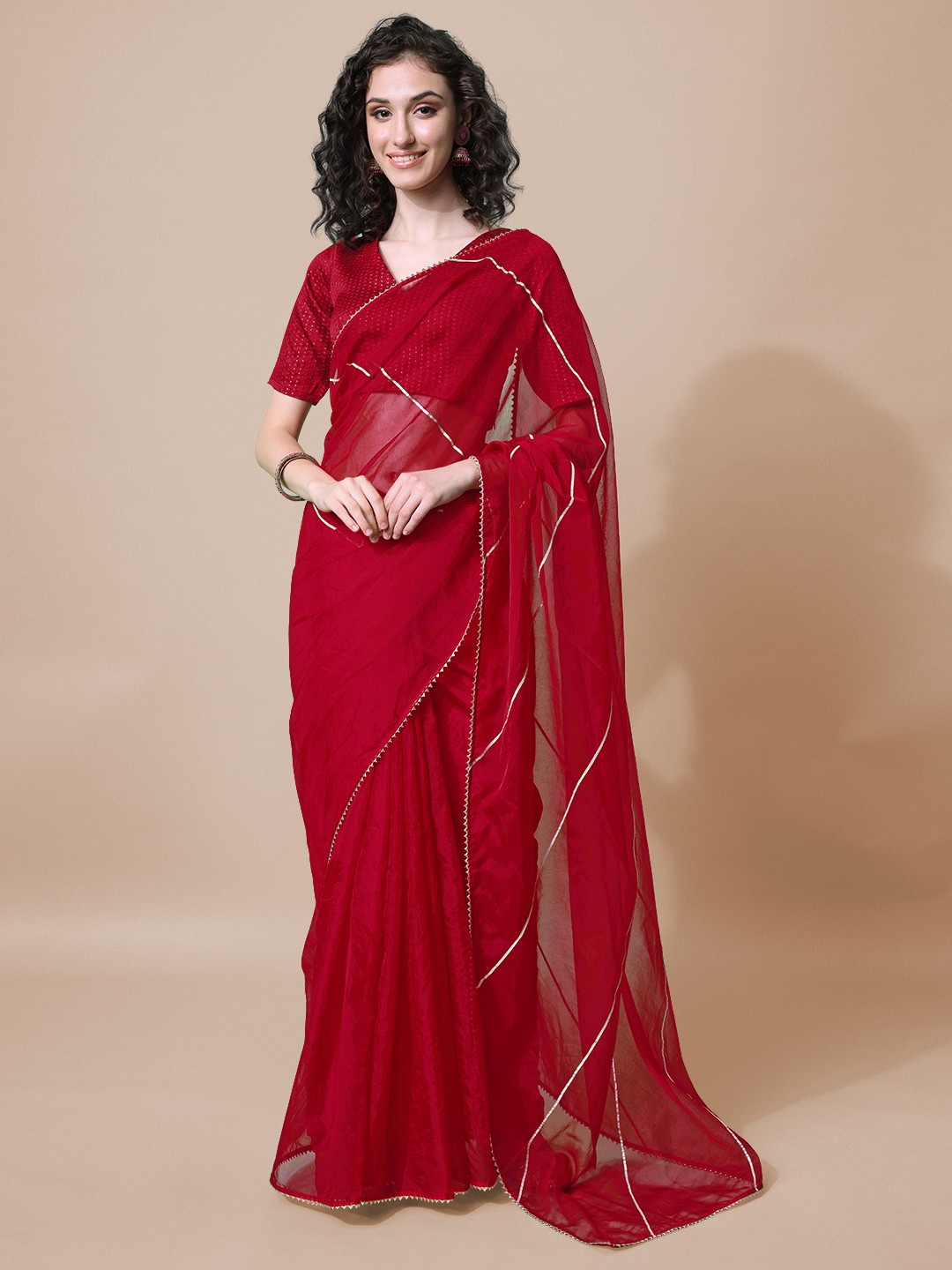 

Sangria Red Solid Organza Saree