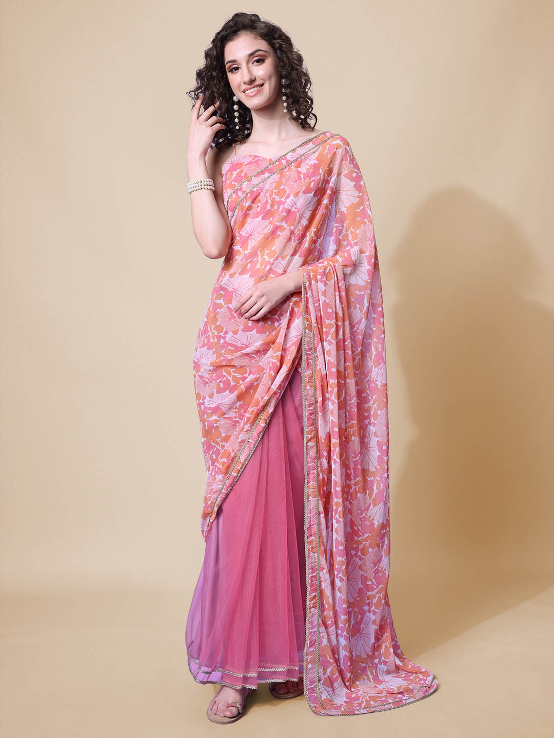 

Sangria Women Peach-Coloured & Pink Printed Floral Saree