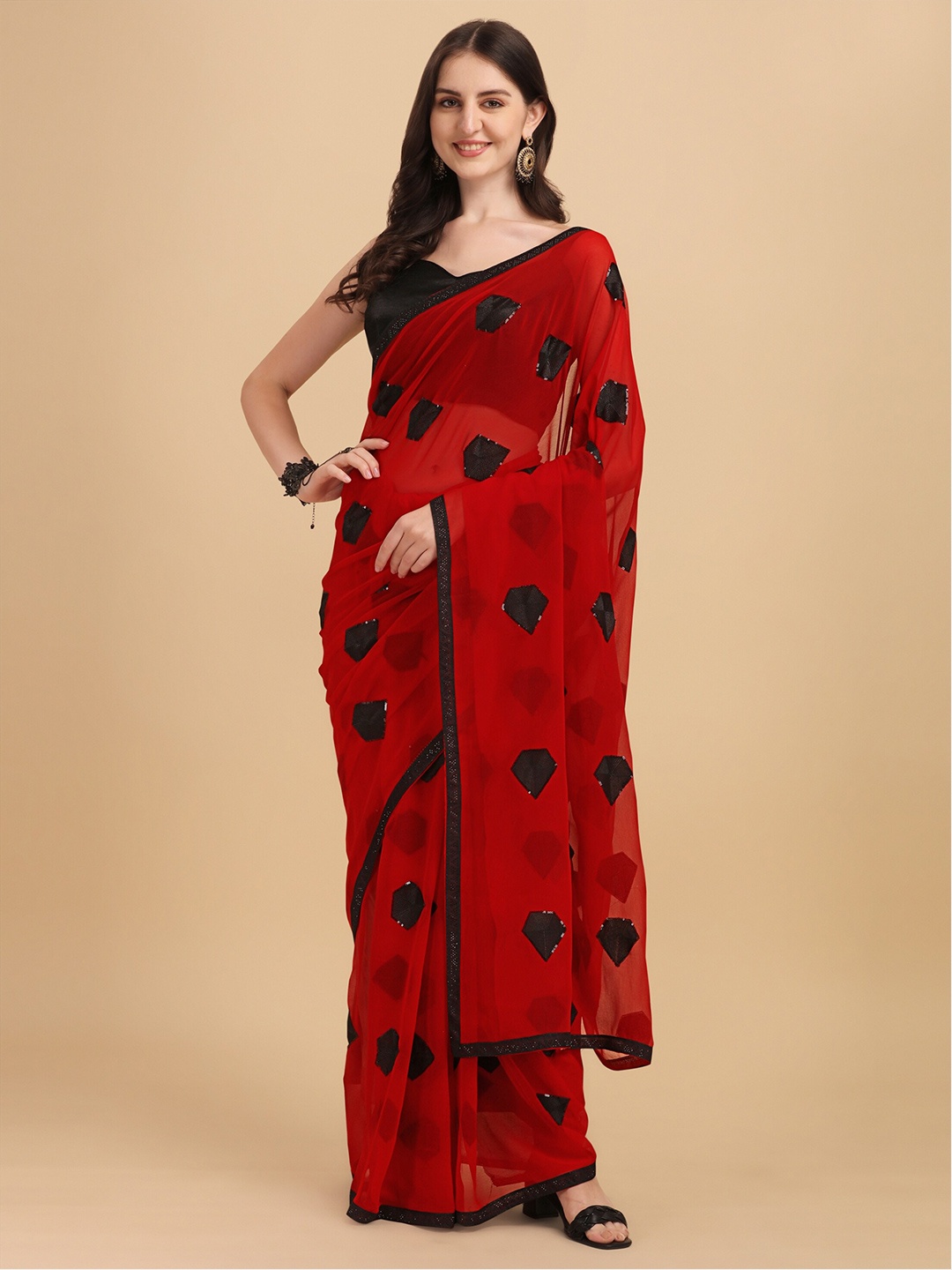 

Vaidehi Fashion Red & Black Sequinned Pure Georgette Saree With Blouse