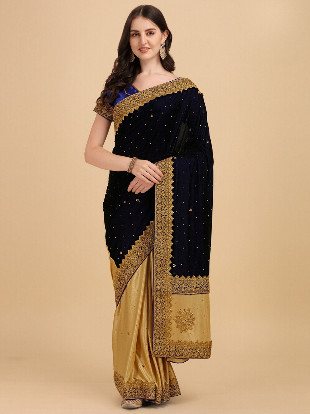 

Vaidehi Fashion Blue & Gold-Toned Floral Embroidered Velvet Heavy Work Saree