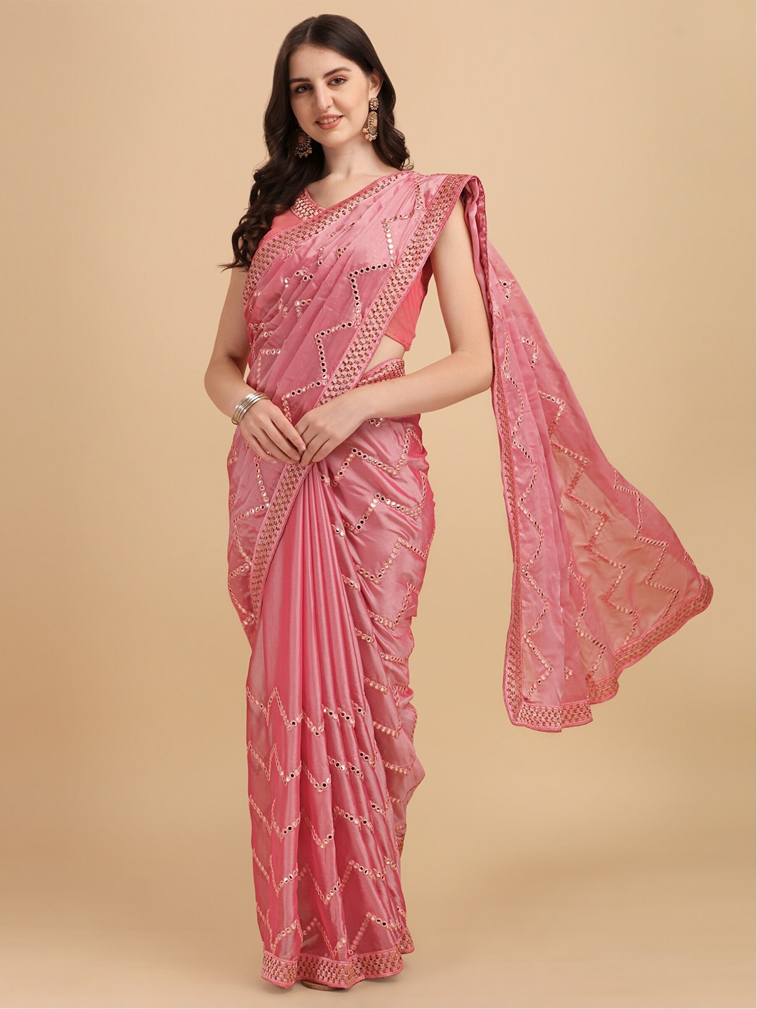 

Vaidehi Fashion Pink Embellished Mirror Work Silk Blend Saree
