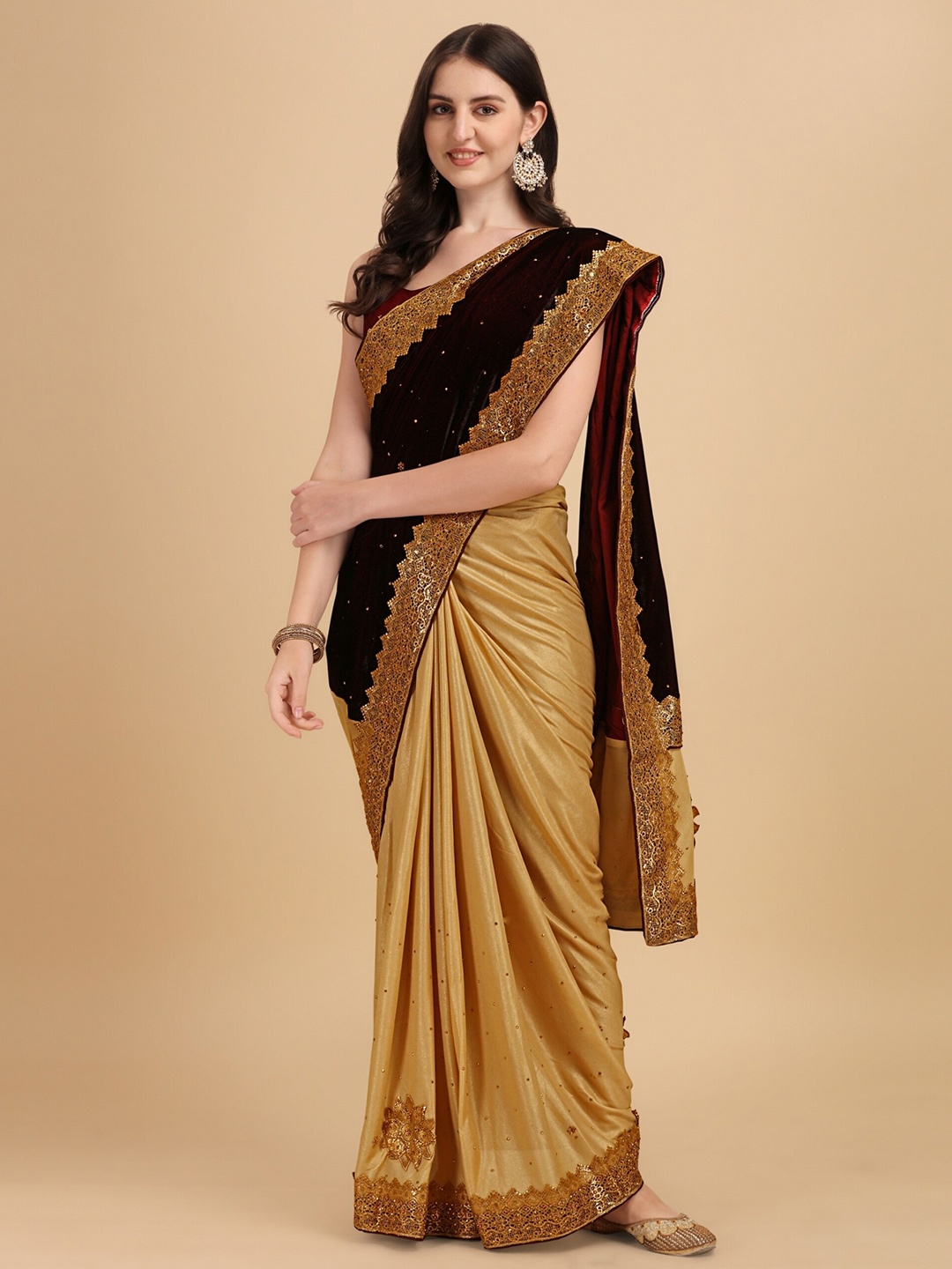 

Vaidehi Fashion Maroon & Black Floral Embroidered Velvet Saree