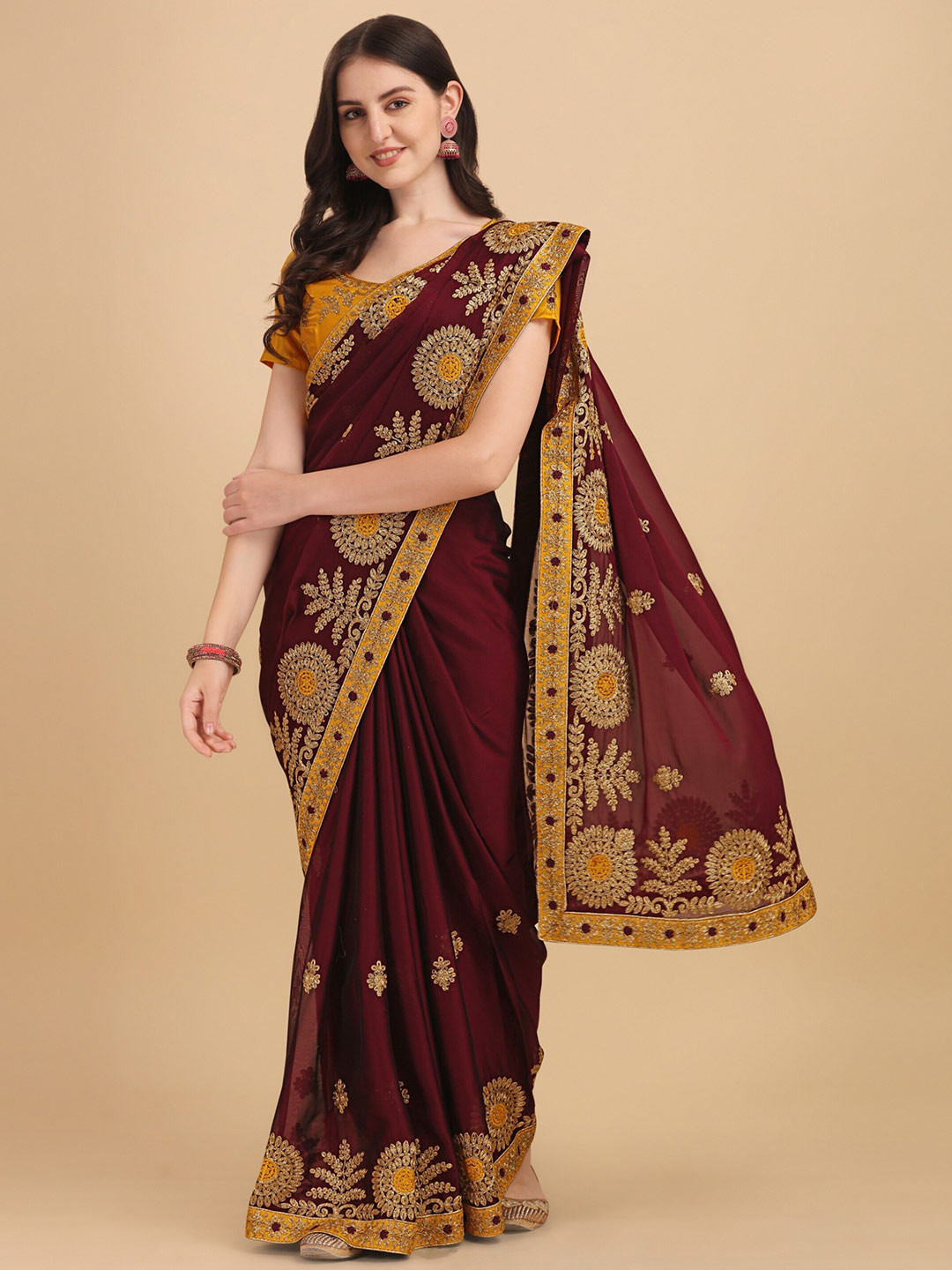 

Vaidehi Fashion Maroon & Gold-Toned Floral Embroidered Silk Blend Heavy Work Saree