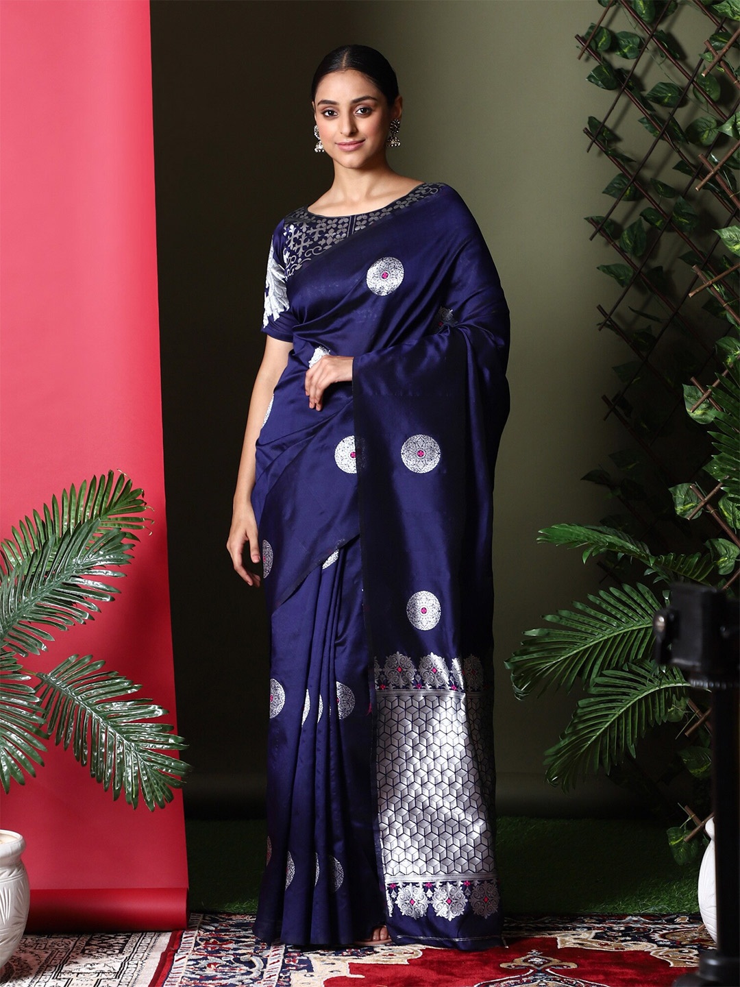 

Glemora Women Blue & Silver-Toned Ethnic Motifs Zari Art Silk Saree