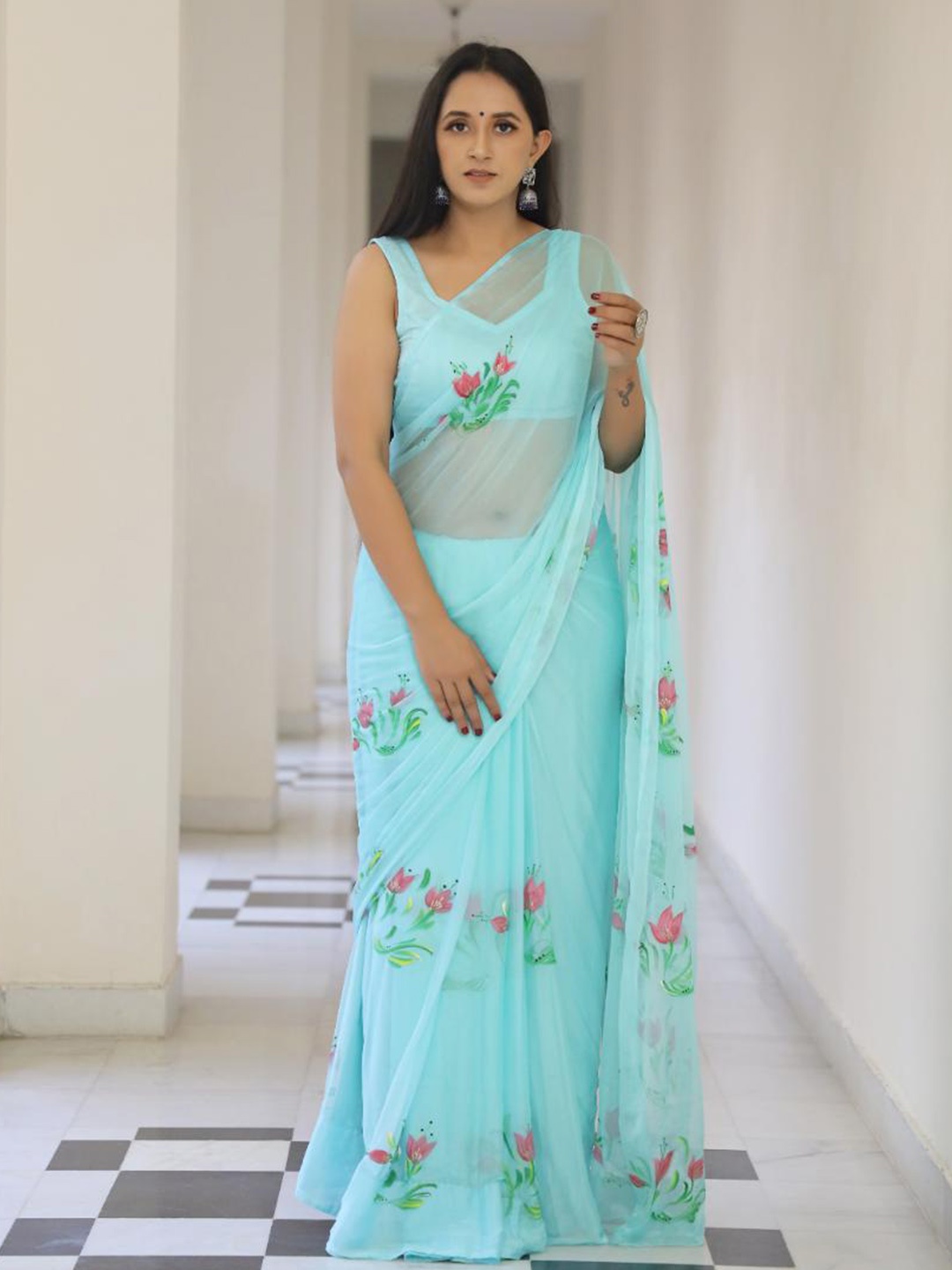 

Baisacrafts Turquoise Blue & Pink Floral Pure Chiffon Saree