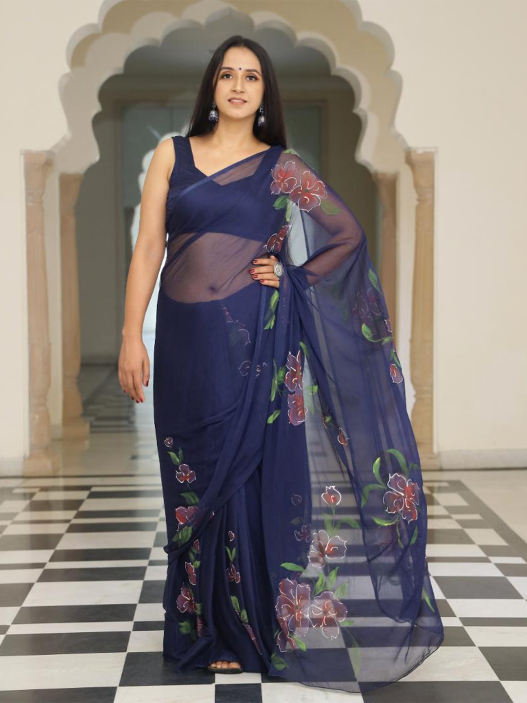 

Baisacrafts Women Blue Floral Handpainted Pure Chiffon Saree