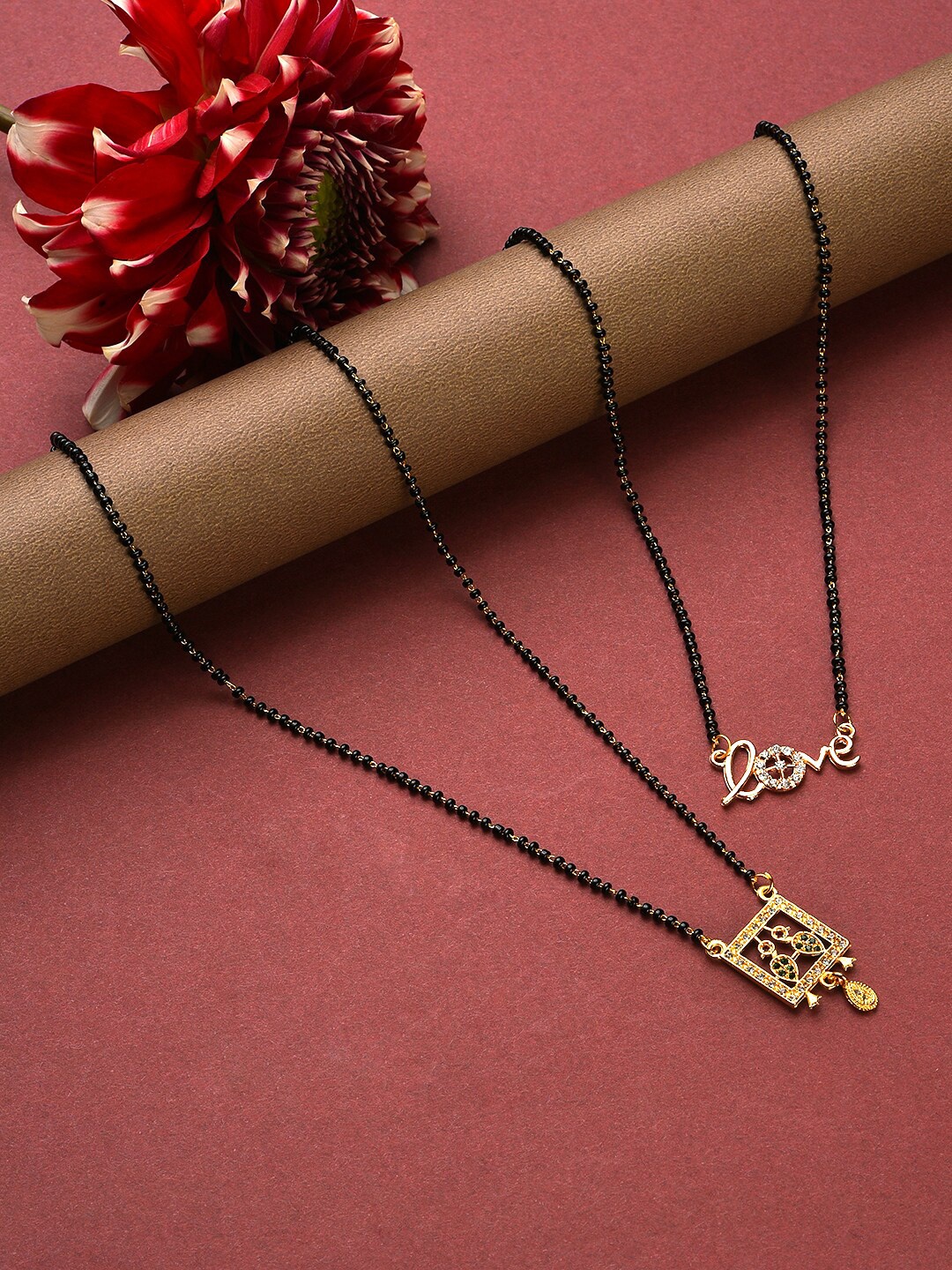 

Jazz and Sizzle Pack of 2 Gold-Plated & Black Beaded & AD-Stones-Studded Mangalsutra