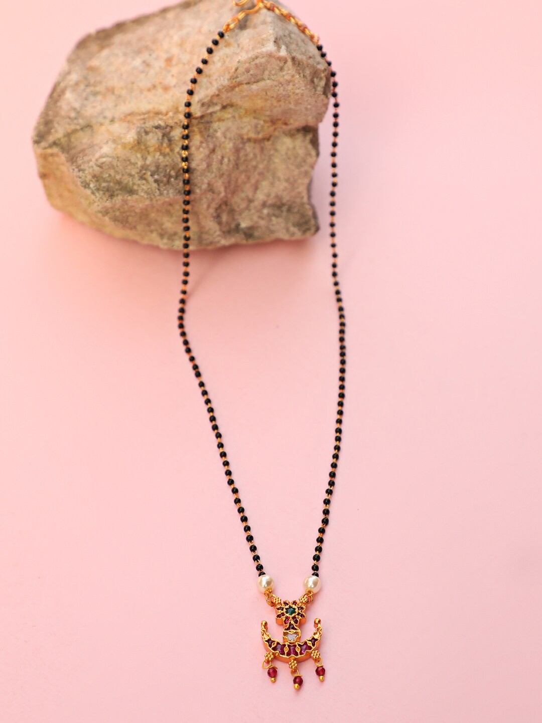 

Jazz and Sizzle Women Gold-Plated & Black Beaded & Stones-Studded Mangalsutra