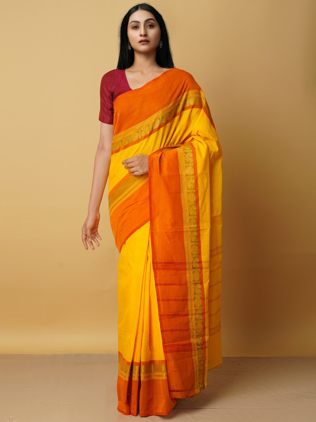 

Unnati Silks Yellow & Orange Zari Pure Cotton Kanjeevaram Saree