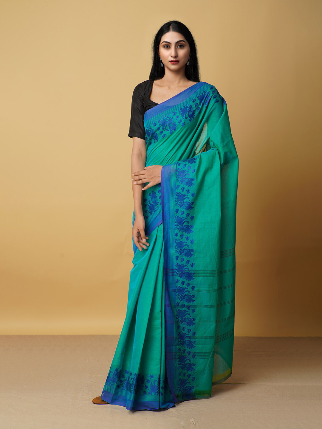

Unnati Silks Green & Blue Zari Pure Cotton Kanjeevaram Saree