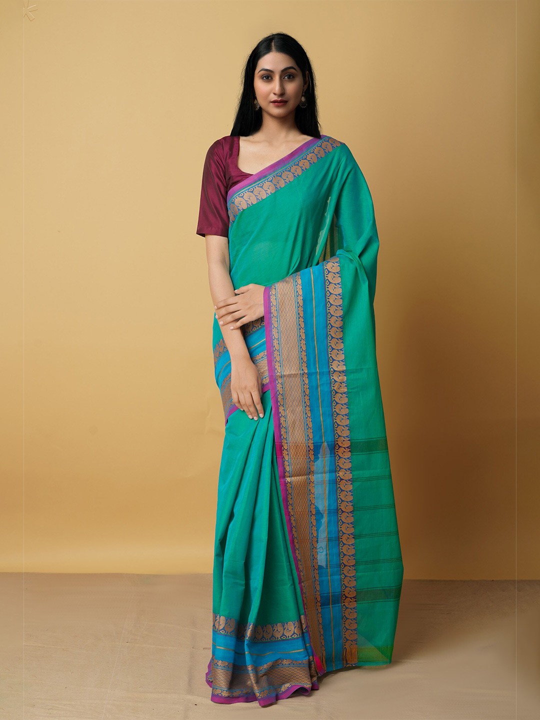 

Unnati Silks Women Green & Blue Woven Design Zari Pure Cotton Kanjeevaram Saree