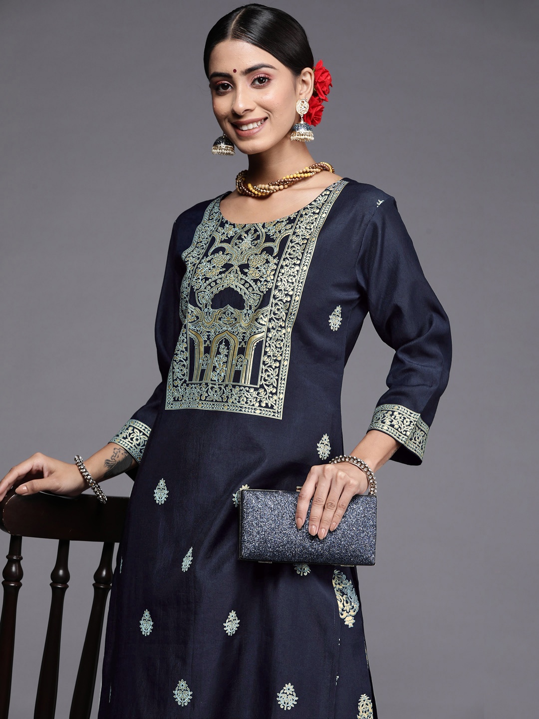 

Indo Era Women Navy Blue Ethnic Motifs Printed Liva Kurta with Trousers