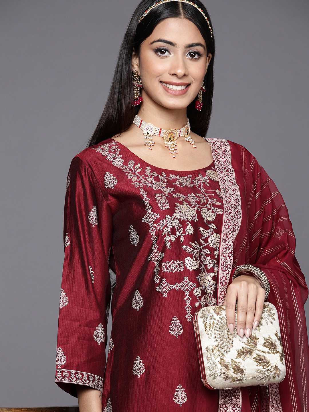 

Indo Era Women Maroon & Golden Ethnic Motifs Printed Liva Kurta with Palazzos & Dupatta