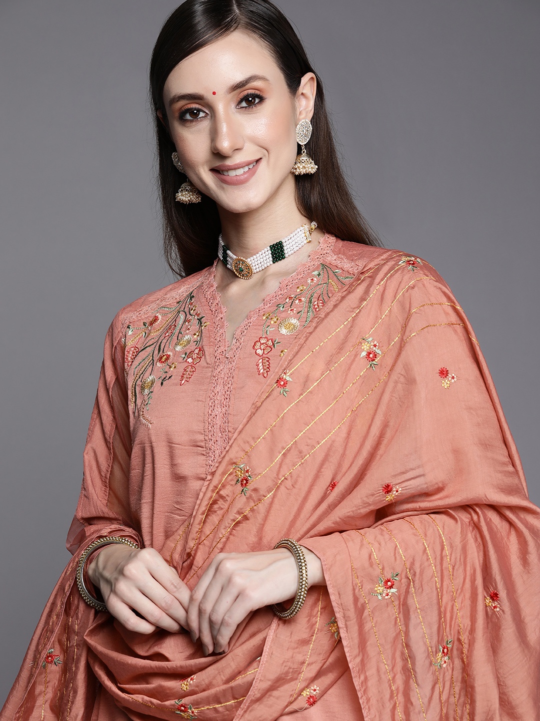 

Indo Era Women Rust Orange Floral Embroidered Kurta with Trousers & Dupatta