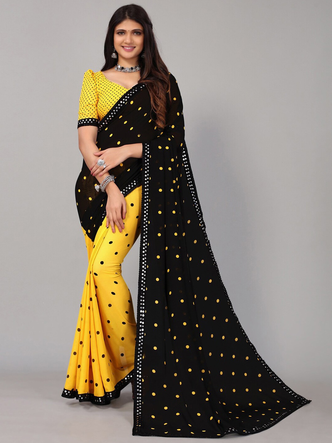 

Mitera Women Yellow & Black Poly Georgette Polka Dots Printed Saree