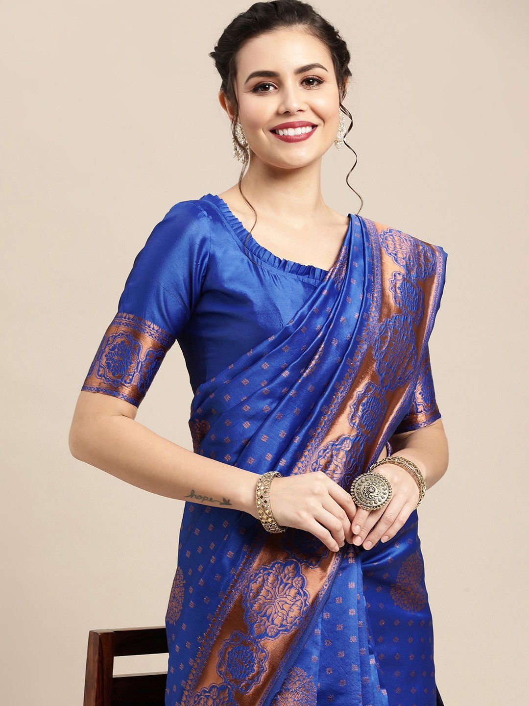 

Saree mall Blue & Copper-Toned Woven Design Zari Silk Blend Banarasi Sarees