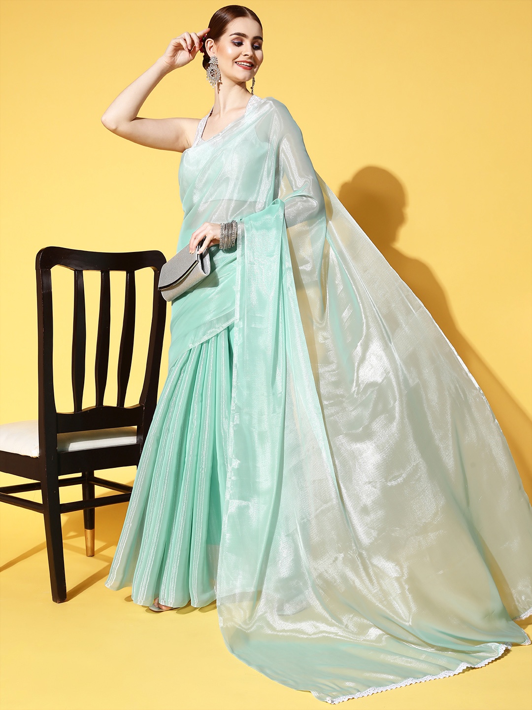 

Saree mall Solid Saree with Embellished border, Turquoise blue