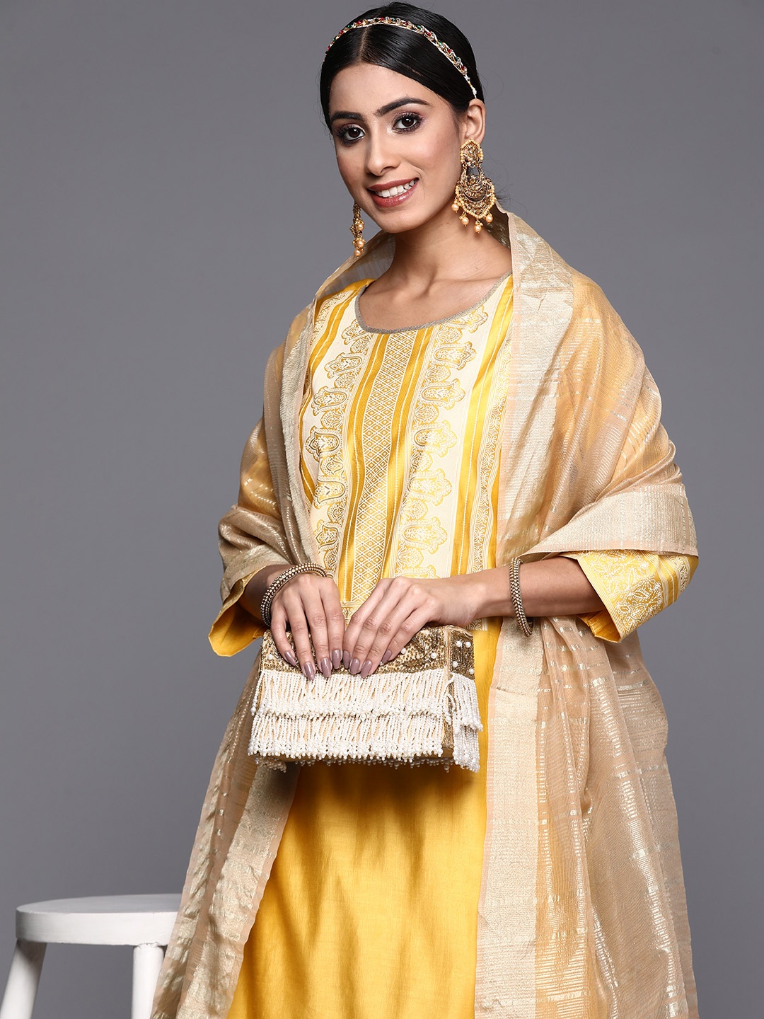 

Indo Era Women Yellow Printed Liva Kurta with Palazzos & With Dupatta