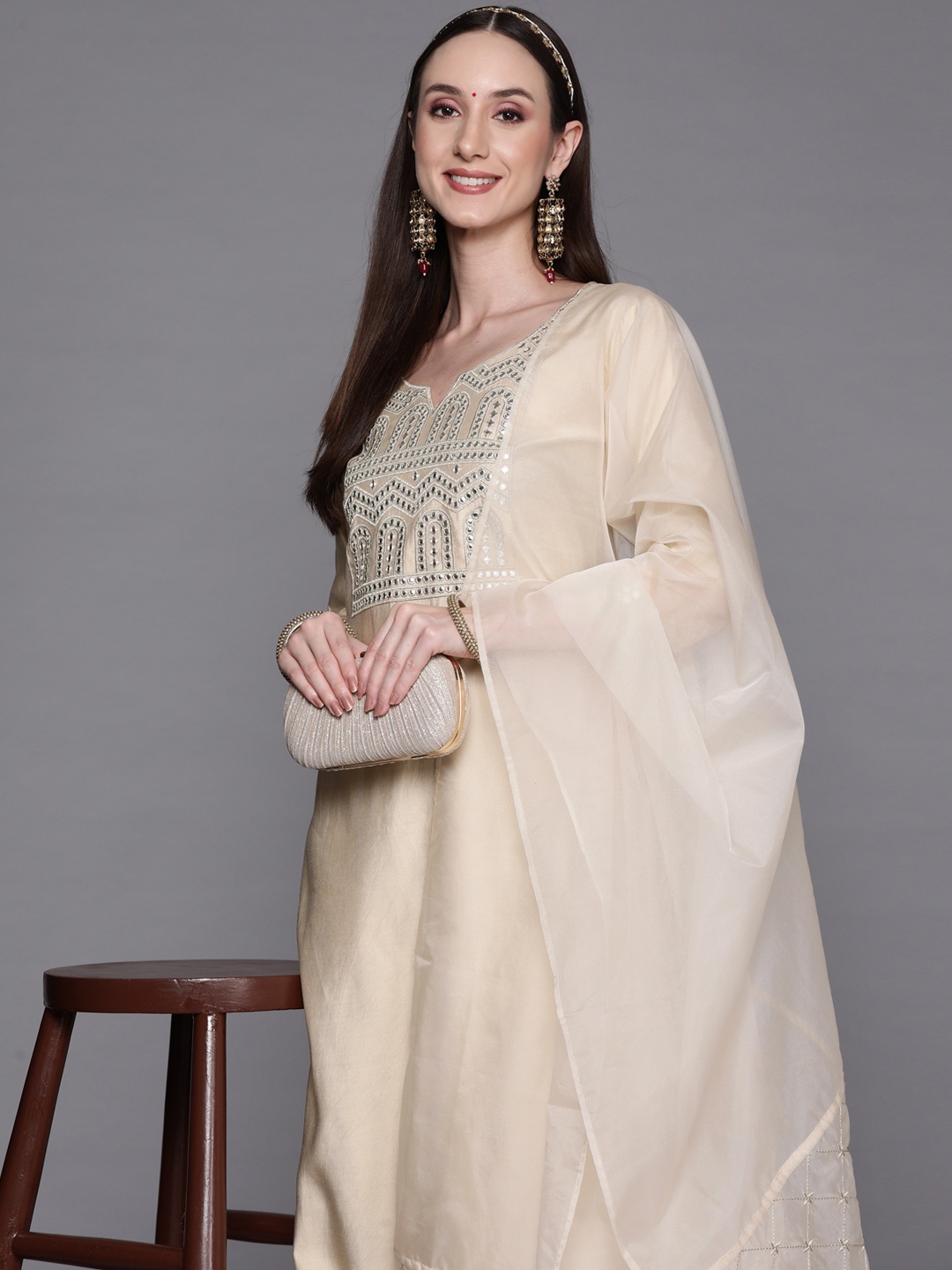 

Indo Era Women Beige Embroidered Mirror Work Liva Kurta with Trousers & With Dupatta