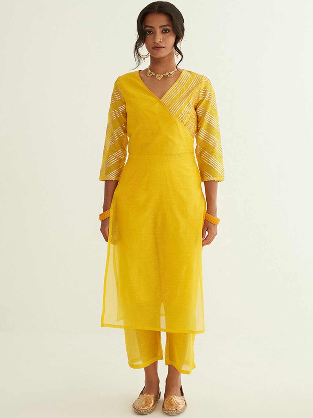 

Abhishti Women Yellow Paisley Yoke Design Gotta Patti Kurta