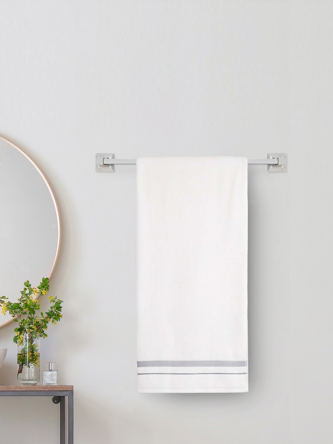 

Home Centre White Solid 380GSM Cotton Bath Towel