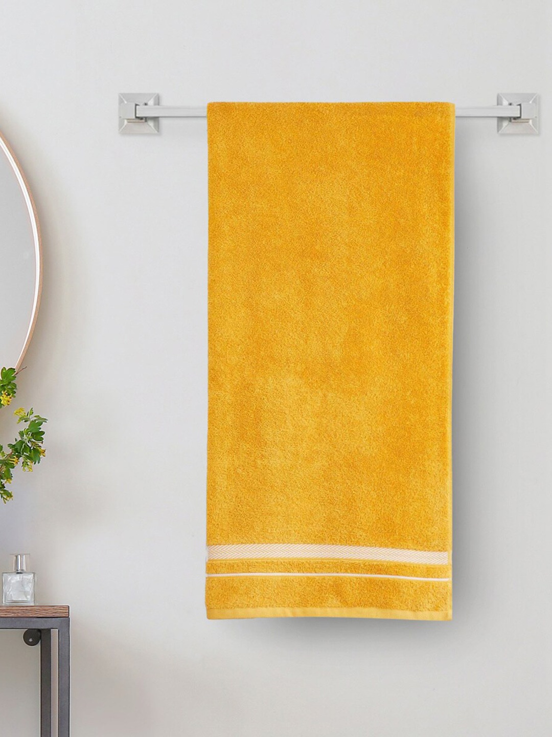 

Home Centre Yellow Solid Cotton 380 GSM Bath Towels