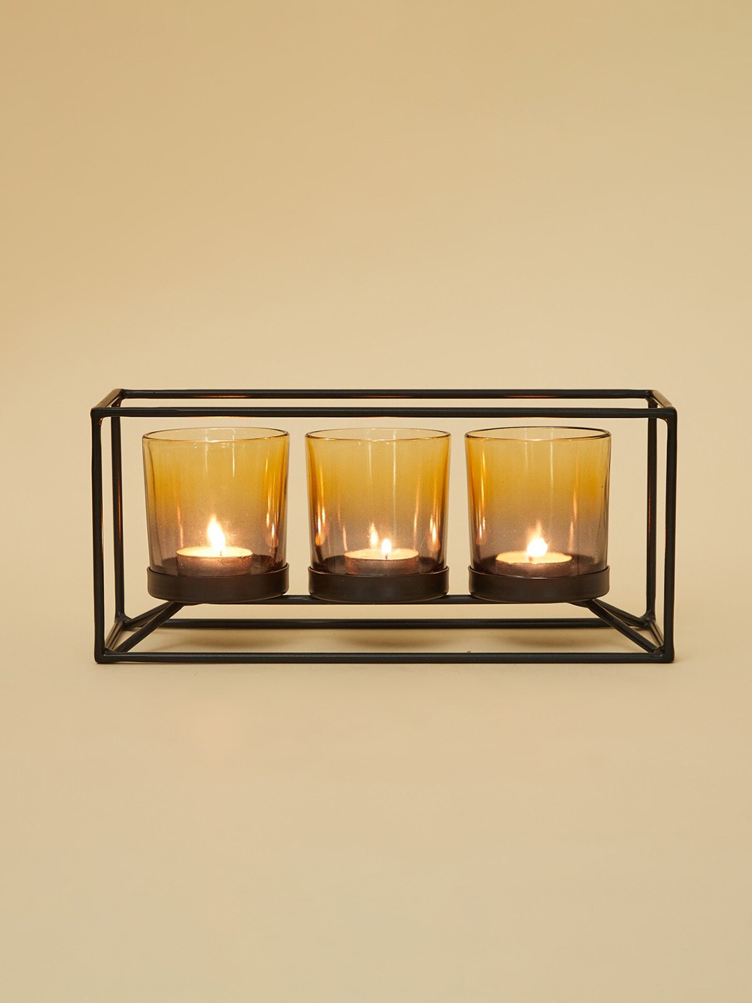 

Home Centre Gold-Toned Solid Votive Holder On Stand