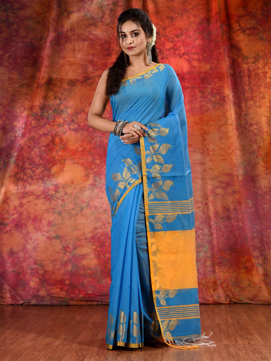 

Charukriti Blue & Yellow Woven Design Saree